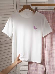 Áo thun cổ tròn tay ngắn dáng rộng màu trắng in hình ngựa tím nhạt, phối cùng quần short ngủ kẻ caro mềm mại, bộ đồ ngủ thoải mái thường ngày dành cho bé gái. - Màu Hồng baby - Xem 2