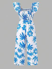 SHEIN Macacão bege claro com estampa floral vibrante em tons de vermelho-alaranjado e folhas verdes, que evoca um jardim primaveril cheio de vida. O decote quadrado realça os ombros e o colo, enquanto as mangas fluidas adicionam um toque dinâmico. A cintura marcada cria uma silhueta elegante, e o corte pantalona proporciona um caimento fluido e discreto. Ideal para férias na praia, chás da tarde no jardim ou passeios por feiras de artesanato, esta peça descontraída e ao mesmo tempo marcante exala uma vibe perfeita para as férias. - Multicolorido - Ver 2