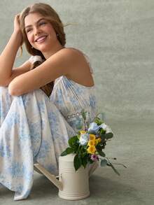 WESTFADE Bộ jumpsuit ống rộng dáng suông, in hoa, cổ tròn, thắt nơ phía trước, tay bồng xếp ly. - Nhiều màu - Xem 6