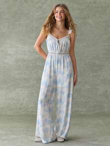 WESTFADE Bộ jumpsuit ống rộng dáng suông, in hoa, cổ tròn, thắt nơ phía trước, tay bồng xếp ly. - Nhiều màu - Xem 3