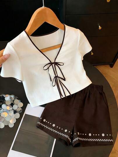 SHEIN Franclia Women's Casual New White Quilted Textured Contrast Trim Faux Linen Bamboo Knot Bow Tie V-Neck Short Sleeve Top + Deep Brown Textured Casual Shorts Commuter Versatile Loose Comfortable 2-Piece Set