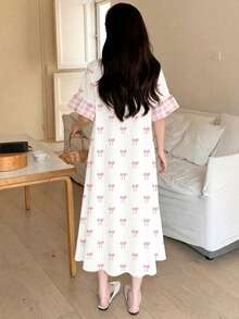 甜美迷你蝴蝶结格子连衣裙，少女休闲宽松简约圆领长裙，荷叶边袖口，适合春夏穿着，营造轻松夏日、度假氛围、阳光之旅、春季休闲穿搭、夏季度假、家庭时光等场景。 - 彩色 - 查看 2