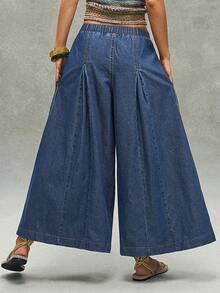 Bohemela BohoFeels Tenue bohème printemps/été : Pantalon ample en denim lavé, coupe large et cropped, style bohème décontracté pour femme. Parfait pour les escapades décontractées, les concerts de style western/country, les festivals de musique et les soirées. Convient pour les tenues de vacances à la plage, le port quotidien, la rentrée scolaire, les sorties et les soirées. Idéal aussi pour les looks inspirés des années 2000, la mode Y2K et les tenues estivales. - Bleu azur - Voir 7