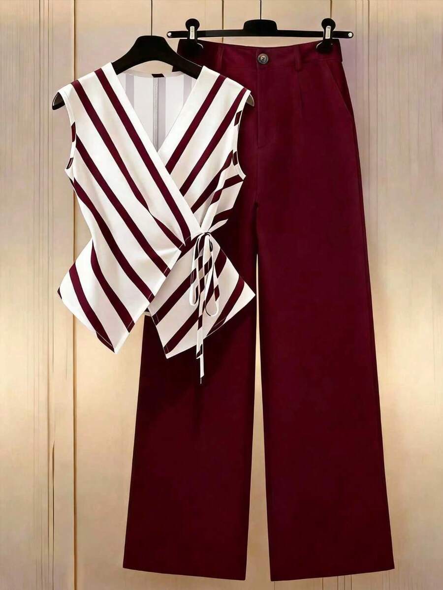 Franclia 女士春夏休闲两件套,包含宽条纹系带衬衫和纽扣装饰斜插口袋阔腿裤,经典黑白两色,打造精致通勤造型。无袖黑白条纹上衣配有可调节系带,V领交叉设计,搭配高腰阔腿裤,实用、简洁、简约、高级,适合通勤、日常穿着、夏季、派对、海滩、约会、毕业典礼、商务场合、都市教师制服等。 - 紅色 - 查看 1