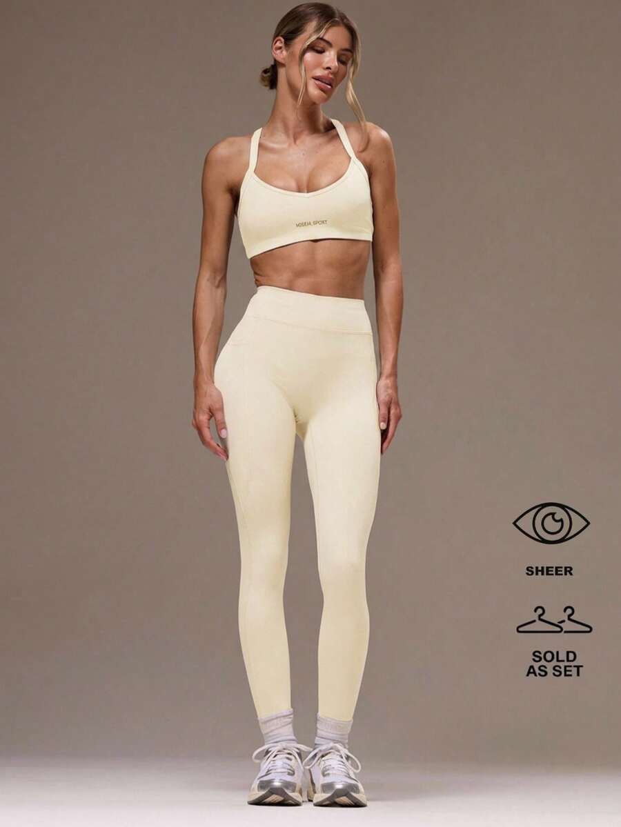 Musera Sport 女士交叉露背上衣和紧身裤运动套装,适合夏季健身。 - 奶油白 - 查看 1