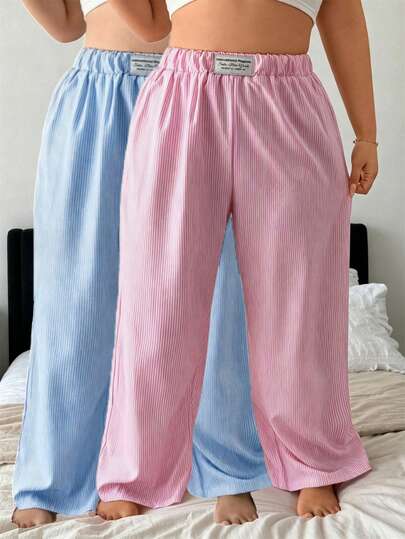 Napfluff CURVE Napfluff CURVE Quần nữ cỡ lớn kẻ sọc dọc, chất liệu nhăn nhẹ, kiểu dáng thường ngày, gồm 2 chiếc.