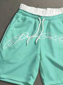 Manfinity Roghcode Pantalones cortos casuales y versátiles para uso diario con cintura con cordón y estampado de letras para hombres - verde menta - Ver 3