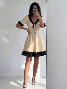 Modelyn 女款春夏針織黑色短袖拼接荷葉邊下擺A字優雅浪漫洋裝，奶油黑對比色荷葉邊飾邊迷你洋裝，胸前黑色緞帶綁帶，奶油色甜美柔美時尚，適合夏季城市漫步、週末旅行與約會之夜，16-30歲女性夏季洋裝 - 杏色 - 查看 6
