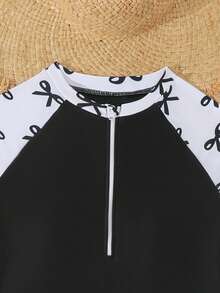 SHEIN 少女坦克比基尼泳衣，休闲保守款，黑色蝴蝶结针织上衣搭配撞色袖子，白色底色饰以黑色蝴蝶结印花，拉链下装搭配撞色下摆，优雅时尚，适合游泳、海滩、泳池、夏季度假。少女泳衣长袖泳装泳裙防晒衣，少女全包覆泳衣，适合乘船旅行，少女泳衣，成人游船连衣裙，少女泳衣，成人泳衣，长袖泳衣 - 黑與白 - 查看 3