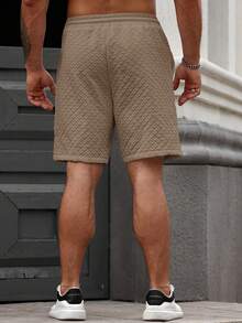 EGENSIO Men's Solid Color Drawstring Pocket Textured Fabric Loose Shorts - Khaki - View 2