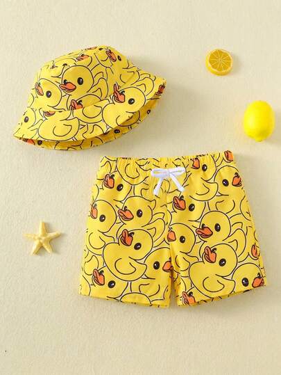 SHEIN Young Boys This Two Pieces Set For Boys, Featuring Swim Trunks And A Sun Hat With A Rubber Duck Pattern, Is Perfect For Beach Vacations, Swimming, And Surfing.