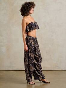 Rouah Bộ đồ nữ gồm áo croptop cổ yếm in họa tiết lá và quần dài cạp thấp, họa tiết cây cỏ, phong cách nghỉ mát biển - Bộ đồ mùa hè phối hợp, bộ hai mảnh mùa hè, bộ quần áo. - màu đen - Xem 4