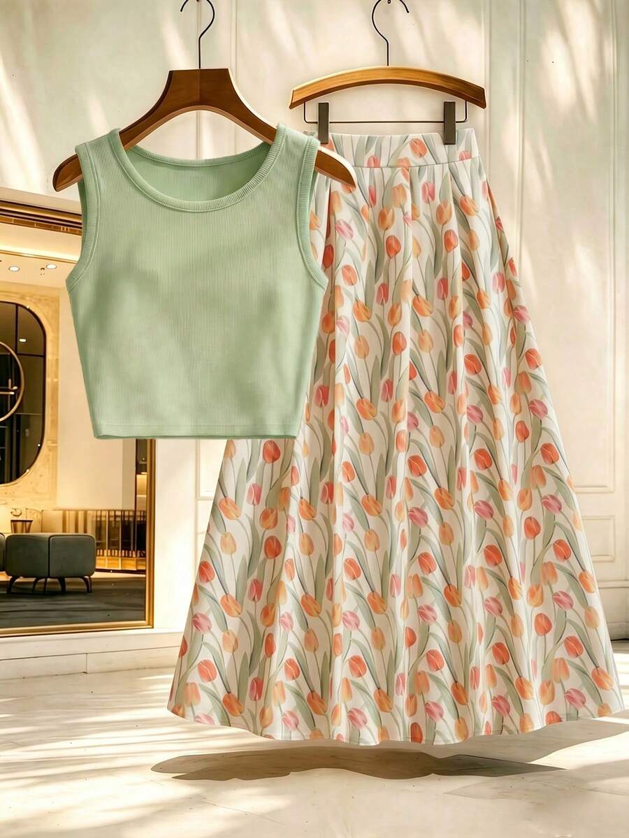 GlowEve Bộ trang phục đi biển cho nữ gồm áo croptop không tay màu xanh nhạt có gân và chân váy midi chữ A cạp cao in họa tiết hoa tulip, kiểu dáng thanh lịch thường ngày. - Nhiều màu - Xem 1