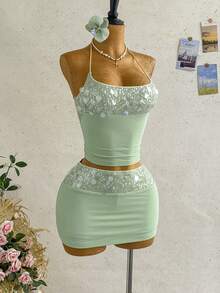 Soleia Bộ đồ nữ phong cách Y2K Bohemian, thích hợp cho kỳ nghỉ hè, du lịch đảo, dự tiệc, lễ hội âm nhạc. Áo hai dây và chân váy mini cạp thấp (có lớp lót) màu xanh bạc hà lấp lánh, phối lưới, thích hợp cho kỳ nghỉ biển, kỳ nghỉ thư giãn cùng bạn bè, bộ đồ tạo điểm nhấn, lễ hội âm nhạc, bộ đồ đi biển, bộ đồ lễ hội âm nhạc. - màu xanh lá - Xem 6