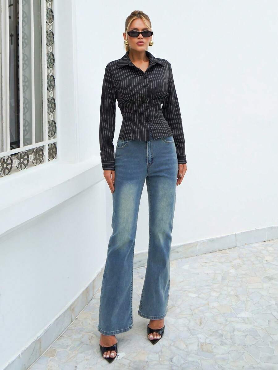 Sandy Gomes Jeans acampanados con lavado de agua para mujeres - Azul - Ver 1