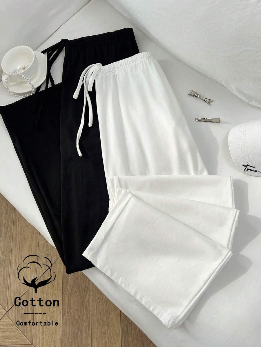 Sweetra Pantalones rectos de mezcla de algodón estilo casual francés en negro y blanco con bolsillos, estilo versátil para la primavera/verano, look elegante de dama - Blanco y Negro - Ver 1