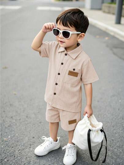 SHEIN 2pcs/Set Young Boy Casual Daily Outfit, Cotton Woven Fabric, Loose Fit Short Sleeve Shirt With Collar And Shorts, Comfortable Outdoor Fabric, Fashionable Fit, Spring/Summer New Arrival, Suitable For Multiple Seasons And Occasions