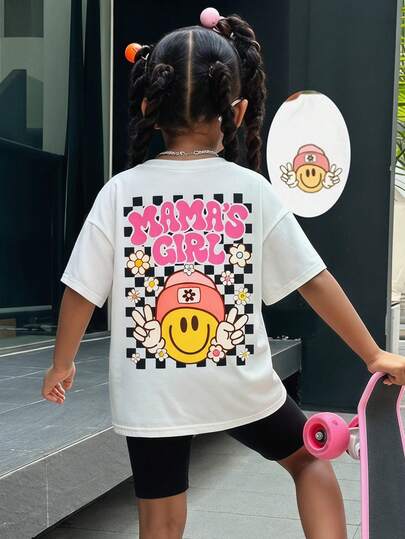 SHEIN Bộ 2 món cho bé gái/trẻ em, áo thun trắng in họa tiết rộng rãi và quần legging đen, trang phục thường ngày năng động, phù hợp cho dã ngoại, du lịch, cắm trại, chụp ảnh, hoặc cả gia đình cùng mặc.
