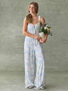 WESTFADE Bộ jumpsuit ống rộng dáng suông, in hoa, cổ tròn, thắt nơ phía trước, tay bồng xếp ly. - Nhiều màu - Xem 5