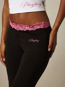 Missguided x Playboy Lace Trim Low Rise Flare Pants With Pink Lace Waistband And Script Logo Detail - Black - View 4