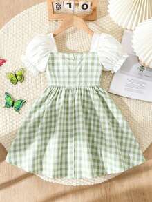 SHEIN Elladie kids 女童夏季新款绿白格纹蝴蝶结装饰连衣裙，法式方领泡泡袖设计，超大白色蝴蝶结和仿珍珠纽扣点缀，A字喇叭裙摆，柔软透气，复古乡村风，适合日常穿着、野餐、生日派对、拍照等各种场合，可爱又时尚，法式简约风，通勤穿搭，适合派对穿着，实用又时髦，充满海岛风情，适合海滩周末度假，是夏季的理想之选。 - 綠色 - 查看 2