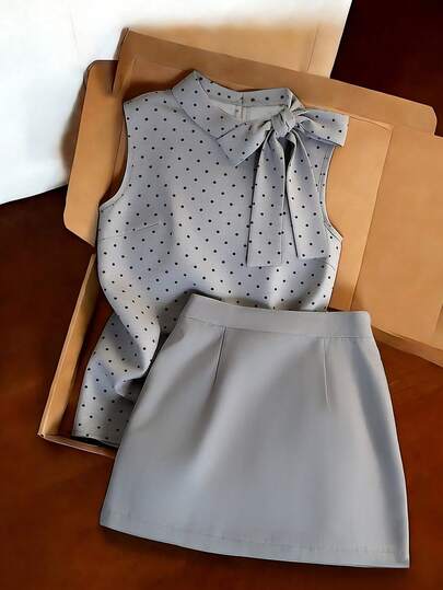 SHEIN Franclia Conjunto de top sin mangas y minifalda elegante, versátil y de estilo casual, romántico y dulce con decoración de lunares y lazo, adecuado para citas, reuniones, fiestas y viajes al aire libre