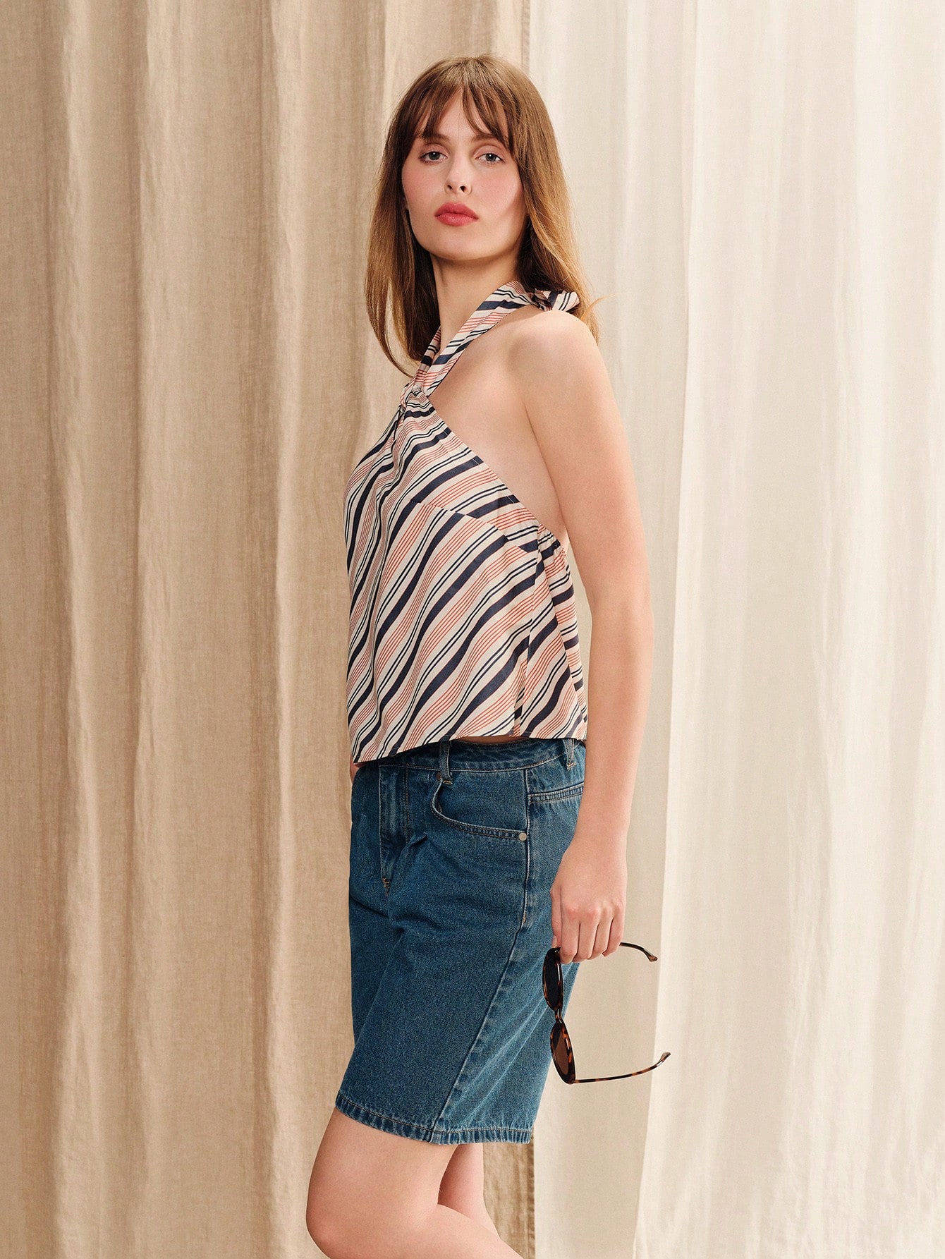 Pink Top With Diagonal Stripe Pattern, Open Back, Halter Neckline, And Tie-Back Detail Chic Style Vacation Pink Satin Top Pink Striped Top Halter Neck Top French Style Top