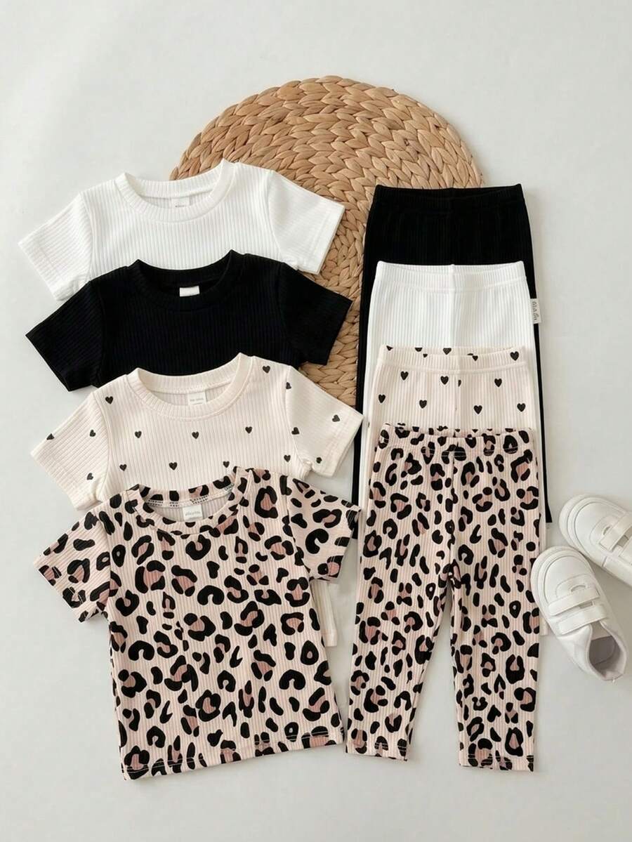 SHEIN Bộ 4 quần legging mùa hè cho bé gái, họa tiết da báo, chấm bi và trái tim, chất liệu mềm mại, co giãn, thích hợp cho kỳ nghỉ, đi biển, tiệc tùng. Quần áo trẻ em in họa tiết da báo, quần legging họa tiết da báo đốm, quần legging dễ thương cho bé gái. - Nhiều màu - Xem 1