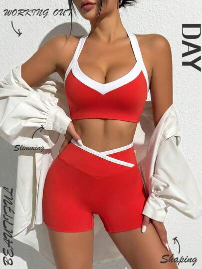 SHEIN Core Rhythm Bộ đồ thể thao nữ gồm áo hai dây buộc cổ và quần đùi cạp chéo, phối màu đỏ trắng tương phản, bộ 2 mảnh gợi cảm.