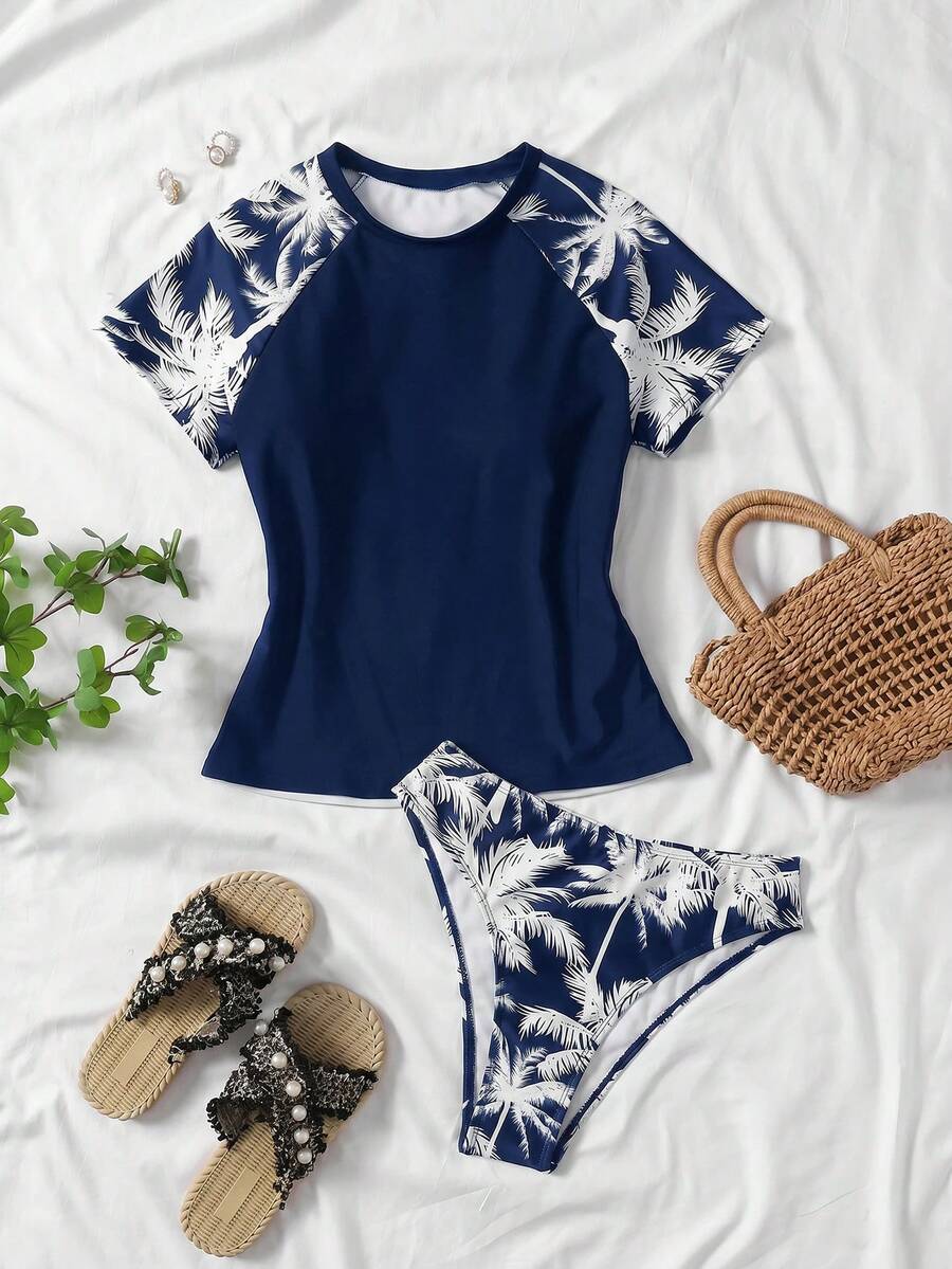 SHEIN Teen Girls Black & Colorblock Palm Tree Pattern Modest Bikini Set, Short Sleeve Top And Bottoms, Suitable For Vacation, Beach, Swimming - Navy Blue - View 1