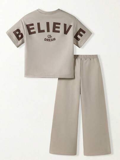 Casuvi Kids Conjunto deportivo informal para niñas preadolescentes, camiseta de cuello redondo holgada y suelta combinada con pantalones relajados, el color melocotón agrega una vibración juvenil, tela suave y amigable con la piel, adecuado para uso diario casual, escuela y vacaciones