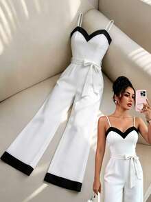 SHEIN Franclia Bộ jumpsuit nữ màu trắng thanh lịch và thoải mái, ống rộng, cổ tim, dây mảnh, thắt lưng buộc eo, kiểu dáng không tay, hoàn hảo cho những buổi hẹn hò mùa hè, mặc hàng ngày, ăn trưa và những chuyến đi chơi cuối tuần, phù hợp cho những ngày thường và những dịp đặc biệt. - trắng - Xem 1