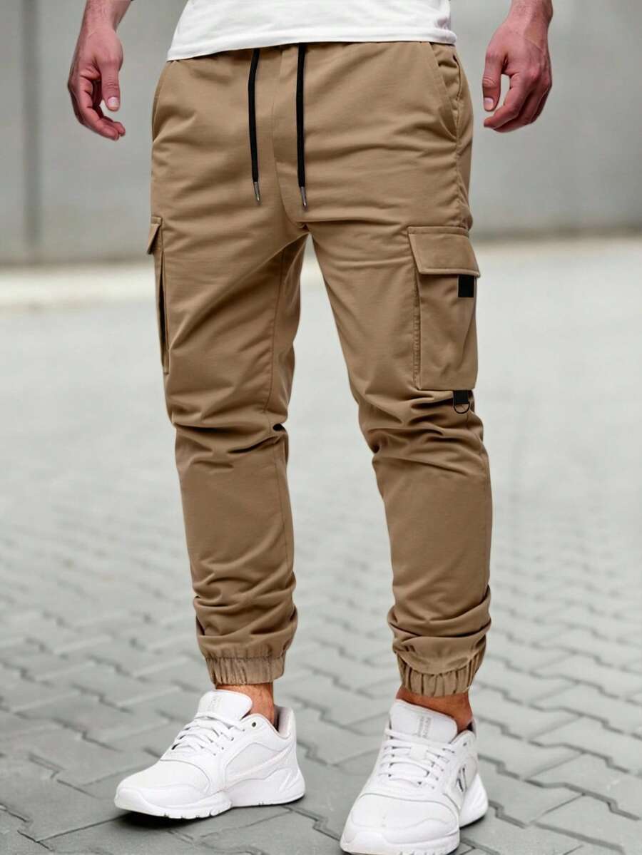 Manfinity Homme 男士休闲弹力腰多口袋慢跑裤,适合日常穿着、旅行、海滩、度假和休闲活动。这款裤子是度假旅行的必备单品,也是送给男友或丈夫的绝佳礼物。 - 卡其色 - 查看 1