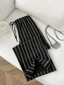 Flirla Quần ống rộng dáng suông, cạp thấp, họa tiết lá bất đối xứng, chất liệu chun co giãn, dành cho nữ, kiểu dáng cơ bản, dễ thương. - màu đen - Xem 5