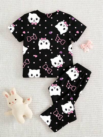 Genkimix Kids Bộ đồ 2 món Dozy Joy cho bé gái, gồm áo thun cổ tròn tay ngắn màu hồng, họa tiết mèo và trái tim dễ thương, chất liệu mềm mại, thoải mái, rộng rãi, thích hợp mặc ở nhà vào mùa hè.