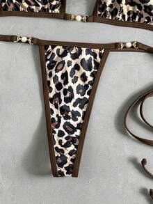 Swim Vcay Bộ bikini nữ họa tiết da báo nhiệt đới gợi cảm, kiểu cổ yếm, gồm áo tam giác và quần buộc dây bên hông, bộ bikini thanh lịch thích hợp cho kỳ nghỉ biển và tiệc tùng. - Nhiều màu - Xem 5