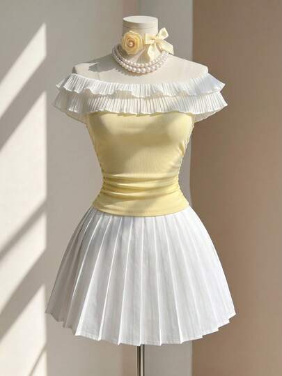 Endroma Camiseta elegante y estilizadora de mujer con volantes fruncidos en la cintura, en color blanco y amarillo patchwork