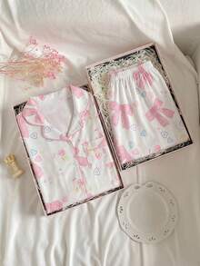 Bộ đồ ngủ tay ngắn và quần short in hình nơ và trái tim dễ thương - Nhiều màu - Xem 3