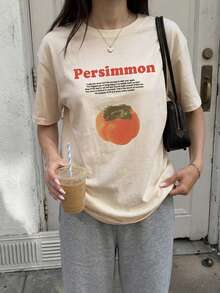 Livesso Blusa holgada y casual de estilo callejero en beige, con cuello redondo y estampado de frutas y letras, camiseta de manga corta básica con vibra de festival de música y vacaciones para mujer, primavera y verano - Beis - Ver 15