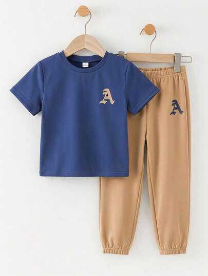 SHEIN Young Boy Letter Print Blue Short Sleeve T-Shirt And Khaki Casual Pants Set