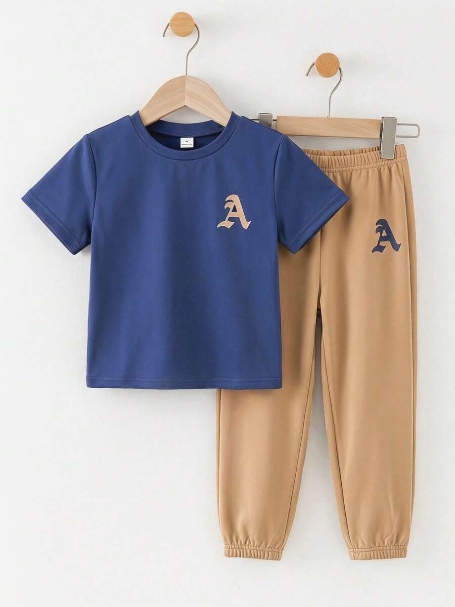 SHEIN Bộ đồ thường ngày cho bé trai: Áo thun ngắn tay màu xanh in chữ và quần kaki. - Nhiều màu - Xem 1