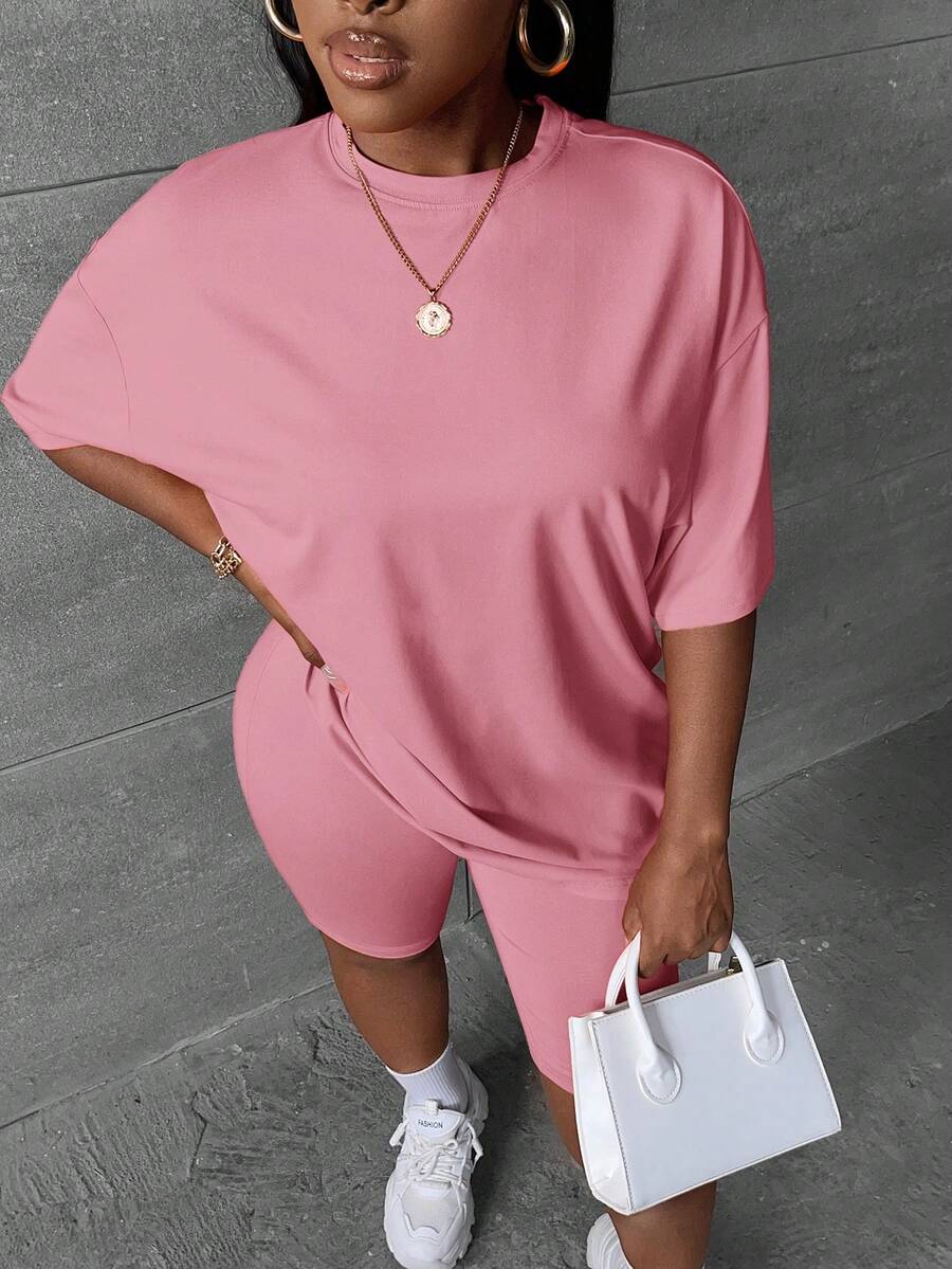Slaydiva Women's Casual Solid Color Round Neck Drop Shoulder Short Sleeve T-Shirt And Shorts Set, Summer - Dusty Pink - View 1