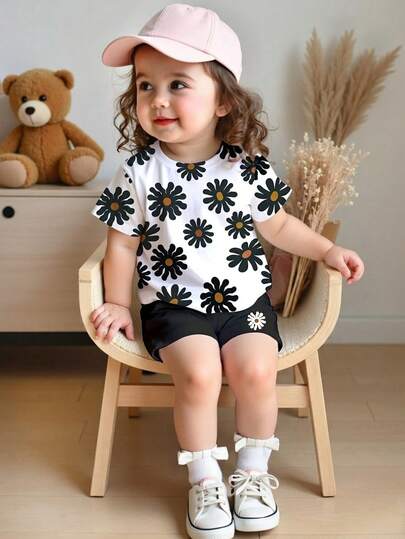 Bộ áo thun ngắn tay cổ tròn in hoa dễ thương kiểu vintage cho bé gái và quần legging, phù hợp với tông màu tươi mát mùa xuân, phong cách đồng quê.