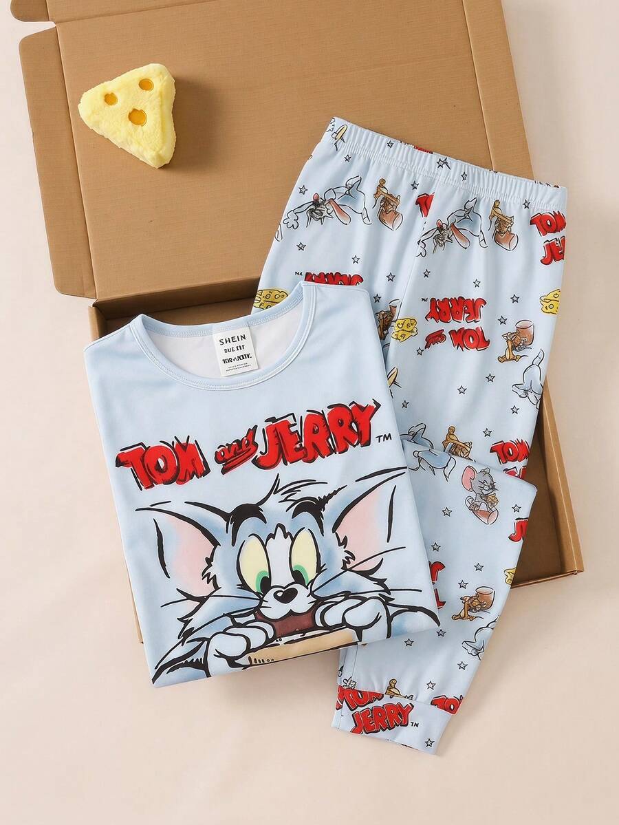 SHEIN Bộ đồ ngủ 2 mảnh cho bé trai tuổi teen, chất liệu mềm mại và co giãn, in hình hoạt hình, gồm áo ngắn tay và quần. - Màu xanh lam - Xem 1
