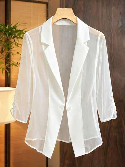 Franclia Áo blazer nữ dáng rộng, cổ ve lật, tay lửng 3/4, chất liệu mỏng nhẹ, không cài cúc phía trước.