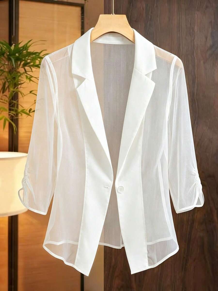 Franclia Áo blazer nữ dáng rộng, cổ ve lật, tay lửng 3/4, chất liệu mỏng nhẹ, không cài cúc phía trước. - trắng - Xem 1