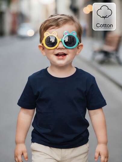 SHEIN Áo thun cotton cổ tròn màu xanh hải quân cho trẻ sơ sinh và trẻ nhỏ, thiết kế đơn giản, tay ngắn, thích hợp mặc hàng ngày, đi học, đi chơi, unisex, cần thiết cho mùa hè, áo thun xanh hải quân cổ điển, áo thun cotton mềm mại cho trẻ em, cổ tròn đơn giản, phù hợp cho bé từ 6 tháng đến 3 tuổi.