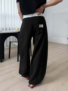 DAZY Pantalones holgados de cintura elástica negros largos con diseño de etiqueta para hombres - Negro - Ver 2