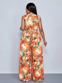SOLERSUN Bộ jumpsuit dài không tay cổ chữ V, ống rộng, cạp chun co giãn dành cho nữ mùa xuân hè, thích hợp cho mặc đi nghỉ mát, đi biển, du lịch biển, nghỉ dưỡng nhiệt đới. Thích hợp mặc hàng ngày, đi mua sắm, đi nghỉ mát, du lịch đảo, du lịch biển, du lịch nhiệt đới. Jumpsuit dáng rộng thoải mái. - trái cam - Xem 4