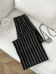 Flirla Quần ống rộng dáng suông, cạp thấp, họa tiết lá bất đối xứng, chất liệu chun co giãn, dành cho nữ, kiểu dáng cơ bản, dễ thương. - màu đen - Xem 2